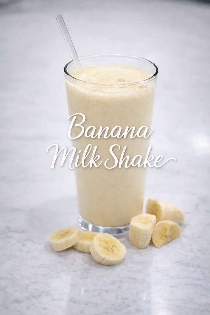 Banana milkshake with banana slices.