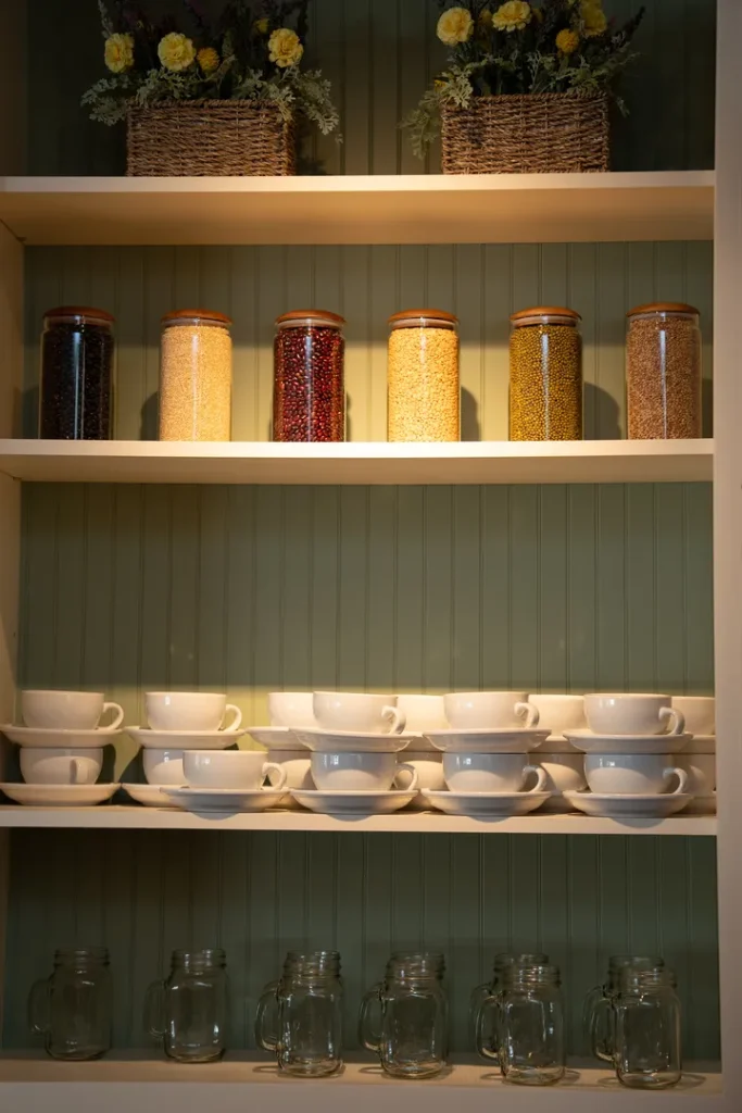 Coffee bar shelves with glasses and cups at Sowa.