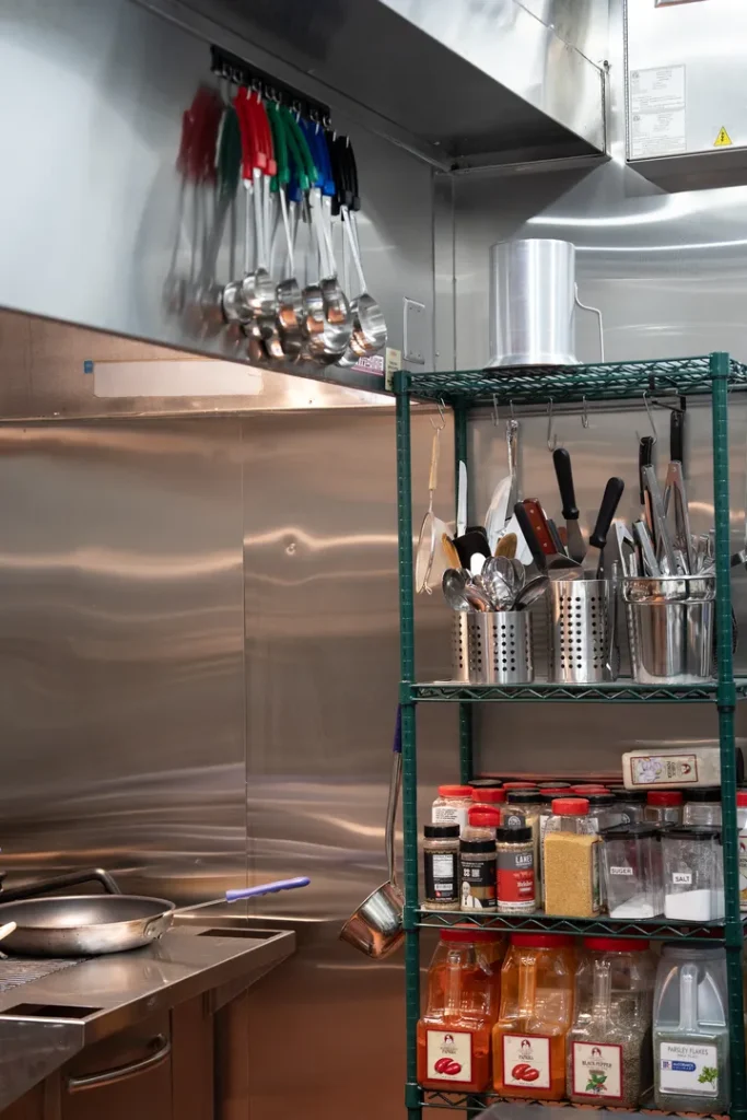 Sowa kitchen preparation area with utensils and ingredients.